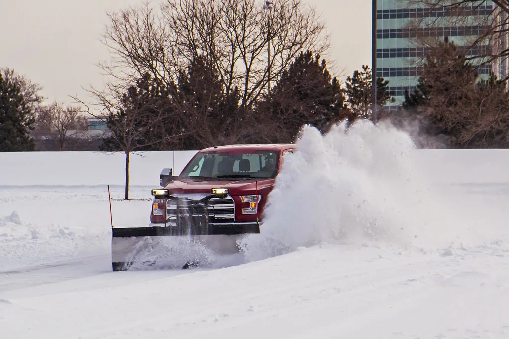 Snow accumulation area for off-site relocation on commercial lot